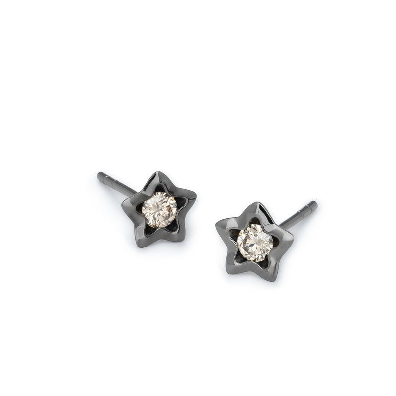 Sterling silver 925°. Open star studs with black CZ